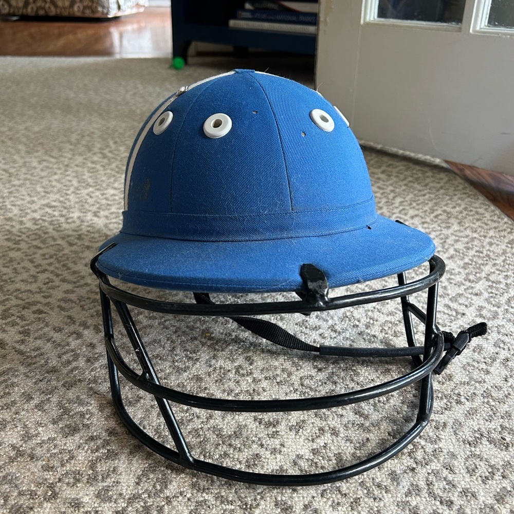 Used polo helmet with face guard